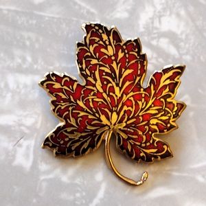 Vintage MMA 1985 leaf brooch.